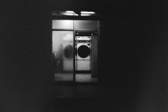 Public Laundry. Camera: Nikon FE. Film: Kodak Tri-X 400 @ 3200. Location: Tel Aviv, Israel.