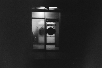 Public Laundry. Camera: Nikon FE. Film: Kodak Tri-X 400 @ 3200. Location: Tel Aviv, Israel.