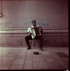 Street Faces. Camera: Kiev 88, Film: Kodak BW400CN.
